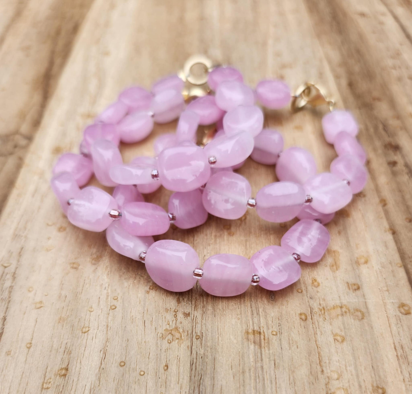 Love bracelet of vintage pink Czech glass