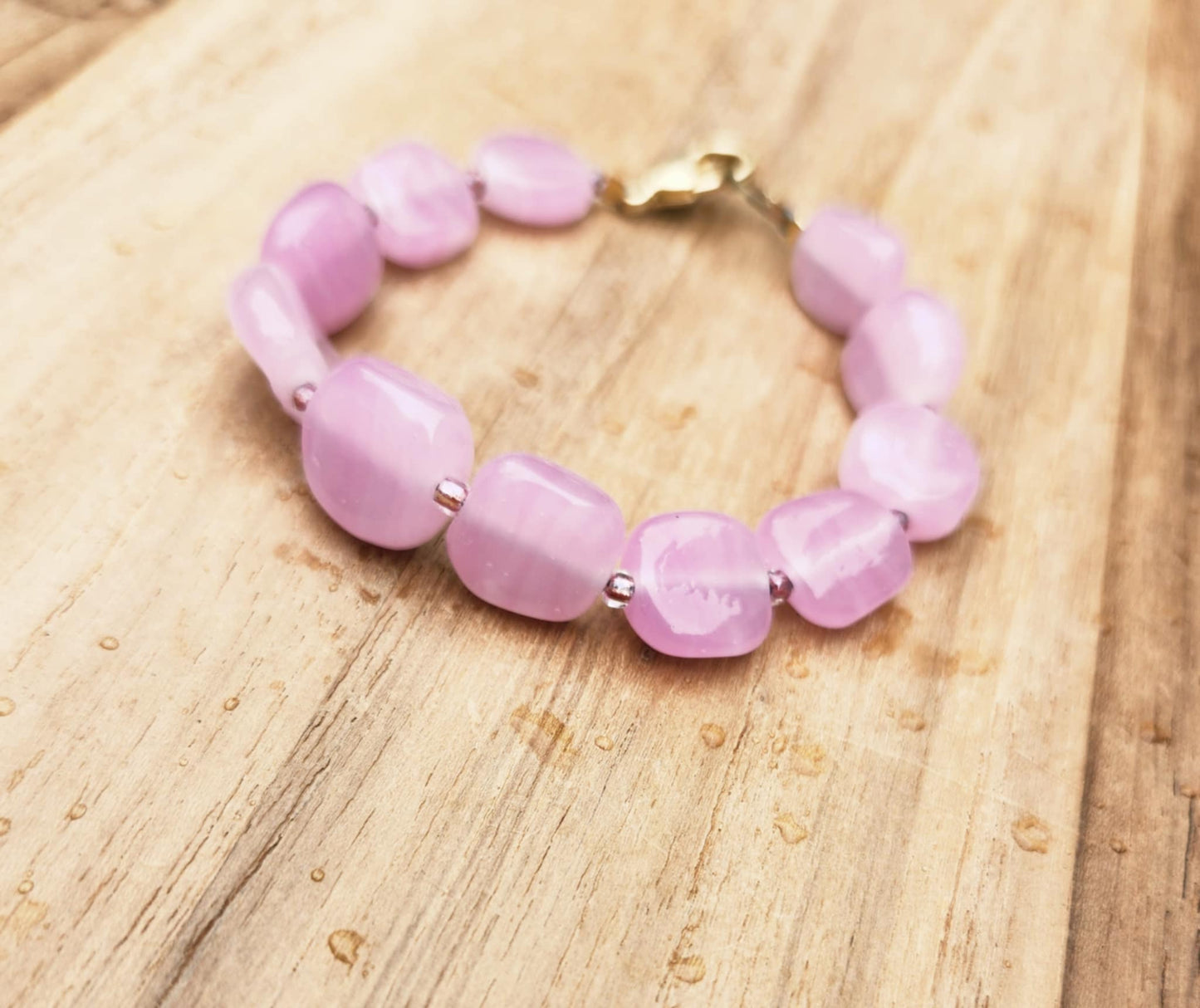 Love bracelet of vintage pink Czech glass