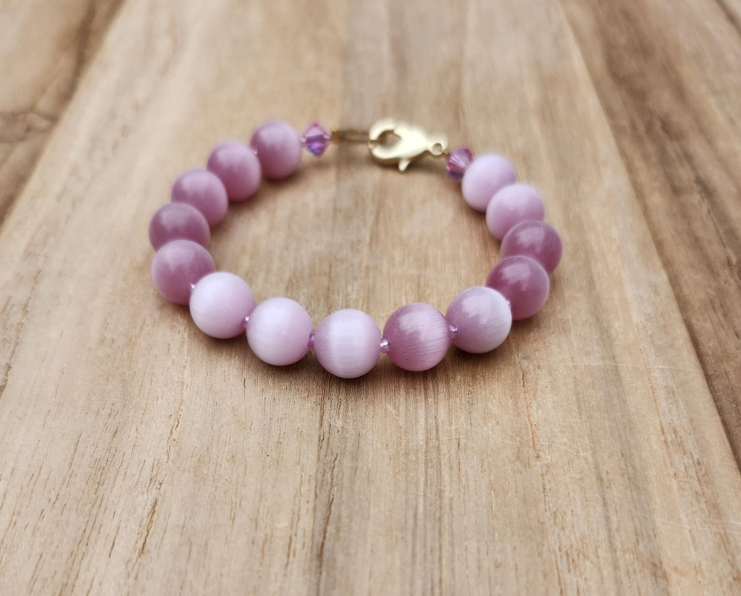 Love bracelet of vintage pink German Cat's Eye beads