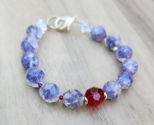 Mental Power bracelet of light purple faceted glass beads
