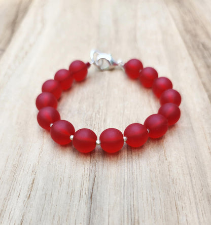 Protection bracelet of recycled red glass beads