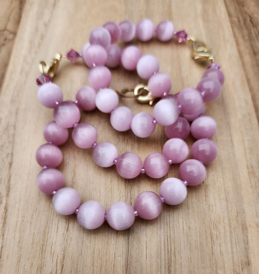 Love bracelet of vintage pink German Cat's Eye beads