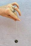 wrapped rainbow fluorite sphere pendulum - Natural Magick Shop